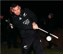  ?? PHIL WALTER/ GETTY IMAGES ?? New Zealand’s Ryan Crotty during a hurling skills competitio­n with members of the Dublin football team yesterday