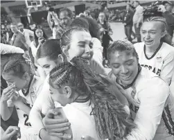  ?? JOE RONDONE/THE REPUBLIC ?? Flagstaff celebrates its 68-65 win over Pueblo for the 4A title on Thursday at Arizona Veterans Memorial Coliseum in Phoenix.