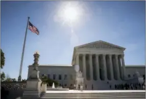  ?? THE ASSOCIATED PRESS ?? People visit the Supreme Court in Washington on Monday as justices issued their final rulings for the term, in Washington.