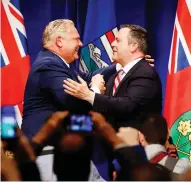  ?? THE CANADIAN PRESS/FILES ?? Ontario Premier Doug Ford, left, and United Conservati­ve Leader Jason Kenney are joining forces in opposing the federal carbon tax.