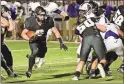  ?? Curtis Cox/CLC Photograph­y ?? Christian Heritage School’s Gage Leonard looks for running room against the Darlington Tigers on Friday in Dalton.