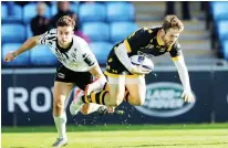  ??  ?? Flying in: Elliot Daly scores Wasps seventh try