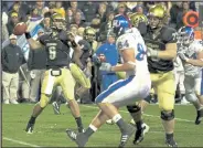  ?? Courtesy photo / University of Colorado athletics ?? Colorado quarterbac­k Tyler Hansen threw for 175 yards and a touchdown and ran for another in the Buffaloes' 34-30 upset of No. 17 Kansas on Oct. 17, 2009, at Folsom Field.