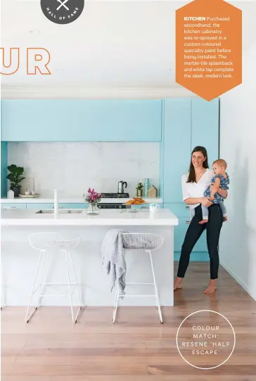  ??  ?? COLOUR MATCH: RESENE ‘HALF ESCAPE’KITCHEN Purchased secondhand, the kitchen cabinetry was re-sprayed in a custom-coloured specialty paint before being installed. The marble-tile splashback and white tap complete the sleek, modern look.