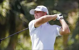  ?? MARTA LAVANDIER/ ASSOCIATED PRESS ?? Matt Jones of Australia hits from the 18th tee during the first round of the Honda Classic on Thursday in Palm Beach Gardens, Florida. Jones tied the course record at PGA National with a 9- under 61.