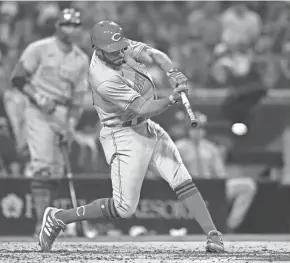  ?? ORLANDO RAMIREZ/USA TODAY SPORTS ?? Cincinnati Reds left fielder Tommy Pham (28) hits a single against San Diego during the fifth inning at Petco Park.