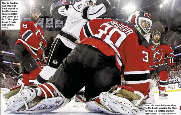  ?? Robert Sabo/new York Daily News ?? Martin Brodeur can only look back at puck as Dustin Penner (c.) celebrates Jeff Carter goal in OT that gives Kings 2-1 win and Game 2. Getty Marty Brodeur believes a key to the Devils winning the Stanley Cup is a matter of effort not tactics.