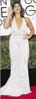  ??  ?? GINA RODRIGUEZ combines two top looks in her Naeem Khan gown.