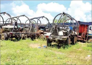  ??  ?? Four of more than 40 vehicles used in the alleged illegal logging that led to the arrest of Soeng Sam Ol were destroyed on Wednesday.