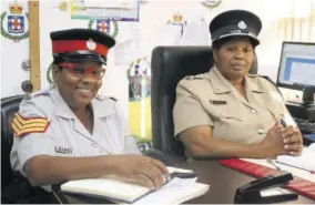  ?? ?? Sub-officer in charge of the Port Maria Police Station, Sergeant Rochelle Mcgibbon-scott (left) is all smiles while talking about the new police station to be built in Port Maria, St Mary. Beside her is commanding officer for the St Mary Police Division Superinten­dent Bobette Morgan-simpson. There have been further delays to the constructi­on of the new building.