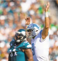  ?? MITCHELL LEFF/GETTY ?? The Eagles’ Fletcher Cox (91) reacts after the Lions’ Matthew Stafford throws a touchdown pass on Sunday.