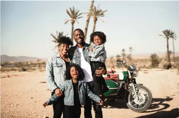  ??  ?? Monet Hambrick, the founder of the Miramar-based website The Traveling Child, and her husband, James, create content to encourage families to travel the globe. She will be giving a presentati­on on Saturday.