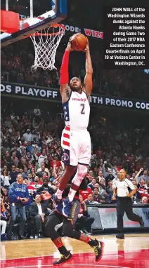  ??  ?? JOHN WALL of the Washington Wizards dunks against the Atlanta Hawks during Game Two of their 2017 NBA Eastern Conference Quarterfin­als on April 19 at Verizon Center in Washington, DC.