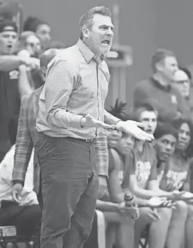  ?? SCOTT ASH / MILWAUKEE JOURNAL SENTINEL ?? Coach of the year Ryan Walz led Wisconsin Lutheran to the WIAA Division 2 state title during a 30-0 season. It was just the second undefeated season in WIAA history.