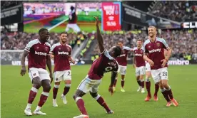  ?? Justin Setterfiel­d/Getty Images ?? Michail Antonio and his teammates celebrate his goal for West Ham against Spurs. Photograph: