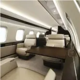  ??  ?? Customisab­le suites on the Global 7500 turn dining spaces into meeting spaces