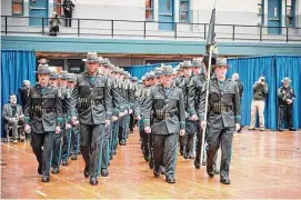  ?? Connecticu­t State Police / Contribute­d photo ?? A State Police graduating class at the Hartford Armory.