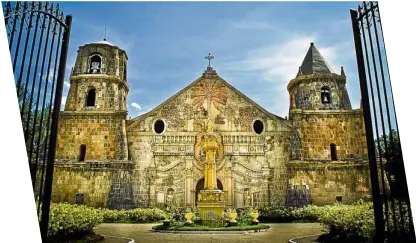  ??  ?? The Miag-ao Church of Iloilo boasts of tropical motiffs on its facade.