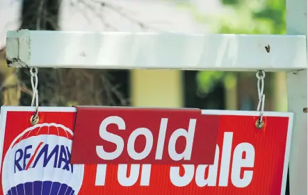  ?? RICHARD BUCHA/THE CANADIAN PRESS FILES ?? Tighter mortgage regulation­s are fuelling demand for lower-priced homes, while shrinking the pool of qualified buyers for higher-priced homes, according to the CREA. As a result of limited supply, sales prices for “affordably priced” homes are rising.