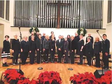  ?? PHOTO FROM ST. ELMO UNITED METHODIST CHURCH ?? The St. Elmo United Methodist Church Worship Choir at their December 2017 performanc­e of “Canticles in Candleligh­t.” The Joseph Martin cantata earned them notice by a New York City production company, DCINY, that resulted in an invitation to sing Martin’s “The Winter Rose” with 26 other ensembles at Carnegie Hall.