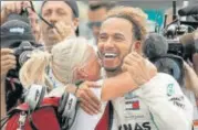  ?? REUTERS ?? This is Lewis Hamilton’s fifth Formula One drivers’ championsh­ip, matching Juan Manuel Fangio.