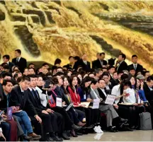  ?? Photos by Dong Ning. ?? On March 15, 2019, Chinese and foreign reporters attend a press conference of the Second Session of the 13th National People’s Congress at the Great Hall of the People in Beijing.
