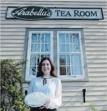  ?? DAVE JOHNSON THE WELLAND TRIBUNE ?? Meghan Chamberlai­n, a volunteer at Arabella’s Tea Room on the grounds of Port Colborne Historical and Marine Museum, holds a homemade pie visitors to the 34th annual Arabella’s Pie Social and History Fair can have with a hot or cold drink on Sunday starting at noon.