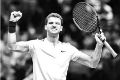  ??  ?? Bulgaria’s Grigor Dmitrov reacts after winning against Belgium’s David Goffin during their men’s singles round-robin match on day four of the ATP World Tour Finals tennis tournament at the O2 Arena in London on November 15, 2017. Dmitrov won the match...