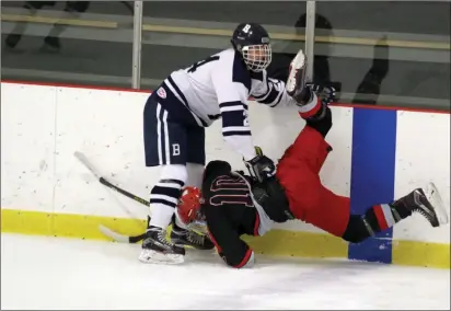  ?? Photos by Louriann Mardo-Zayat / lmzartwork­s.com ?? Burrillvil­le defenseman Aiden Tupper (24, above) checks Cranston West’s Justin Neary (10) during the Broncos’ 6-3 victory over the Falcons Wednesday at Levy Rink. Senior forward Kyle Pelletier netted a second-period hat trick to help snap a three-game...