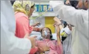  ?? SAUMYA KHANDELWAL/HT FILE PHOTO ?? A school girl receives treatment after a gas leak at the Tughlakaba­d container depot on Saturday.