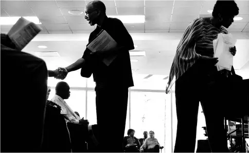  ??  ?? Job seekers 55 and older arrive at the District of Columbia’s Department of Employment headquarte­rs in Washington D.C. on Mar 23, 2012. — WP-Bloomberg photo