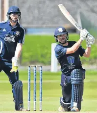  ??  ?? Forfarshir­e’s Craig Wallace hits out against Aberdeensh­ire.