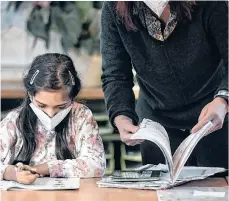  ?? /INA FASSBENDER/AFP/GETTY IMAGES ?? El uso correcto de la máscara es una de las maneras de prevenir la infección.