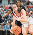  ?? ALIE SKOWRONSKI/COLUMBUS DISPATCH ?? Ohio State guard Taylor Mikesell passes to a teammate against Cincinnati on Saturday.