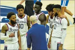  ?? DAVID BUTLER II/USA TODAY SPORTS ?? UConn men’s basketball coach Dan Hurley talks to R.J. Cole (1), Brendan Adams (10), Adama Sanogo (middle top), Andre Jackson (44) and Tyler Polley (12) during Wednesday night’s game against Central Connecticu­t State at Gampel Pavilion in Storrs.