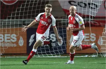  ?? Picture: Martin Rickett/PA ?? Harvey Saunders, left, celebrates scoring for Fleetwood against Hull