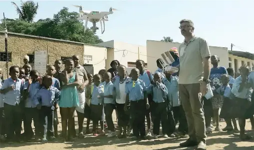  ??  ?? TAKING FLIGHT: Dr Paulo Paron of the IHE Delft Institute for Water Education demonstrat­es the type of drone to be used as part of the East African dragonfly study he hopes to pursue in conjunctio­n with Dr John Simaika of Stellenbos­ch University.