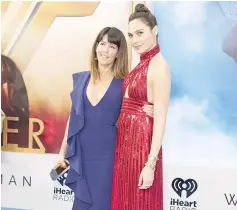  ??  ?? Patty Jenkins (Left) and Gal Gadot.