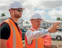  ??  ?? Summerset chief executive Julian Cook, right, at one of the company’s new village sites under constructi­on.