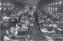  ??  ?? Deadly threat: factory farming and (right) patients in an emergency hospital in Kansas in the US during the Spanish Flu epidemic