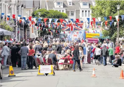  ??  ?? ■ Cardiff council has backed down on plans to charge £150 to residents wanting to hold street parties for the Queen’s 90th birthday