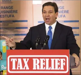  ?? DOUG ENGLE — OCALA STAR-BANNER VIA AP ?? Florida Gov. Ron DeSantis speaks during a news conference at MVP Appliances in Ocala on Wednesday. DeSantis mentioned Disney and how it will be no longer be self governing “because there’s a new sheriff in town.”