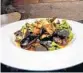  ??  ?? Mussels are served with chourico garlic, white wine, malagueta pepper, tomato fish stock and olive oil.