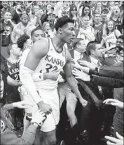  ?? Jamie Squire Getty Images ?? KANSAS’ David McCormack received a two-game suspension for his role in brawl against Kansas State.