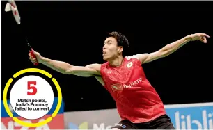  ?? AFP ?? Kazumasa Sakai of Japan returns a shot against HS Prannoy of India in the men’s singles semifinal match at the Indonesia Open. —