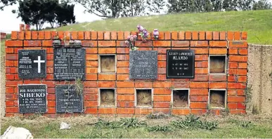  ?? /KABELO MOKOENA ?? A memorial wall housing the cremated remains of people has been vandalised, allegedly by drug users, to steal the ashes.