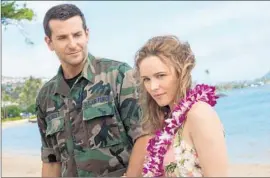  ?? Neal Preston
Sony Pictures Entertainm­ent ?? “ALOHA” WITH BRADLEY COOPER and McAdams may have bombed earlier this year, but she says the moviemakin­g experience in Hawaii was “magical.”