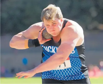  ?? Photo / Photosport ?? Jacko Gill successful­ly defended his shot put title yesterday.