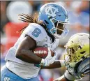  ?? JOHN AMIS FOR THE AJC 2019 ?? North Carolina’s Michael Carter ran for 1,245 yards and nine touchdowns as a role-playing running back with North Carolina.