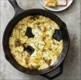  ?? JOE KELLER—AMERICA’S TEST KITCHEN VIA AP ?? This undated photo provided by America’s Test Kitchen in October 2018 shows baked brie with honeyed apricots in Brookline, Mass. This recipe appears in the cookbook “All-Time Best Appetizers.”